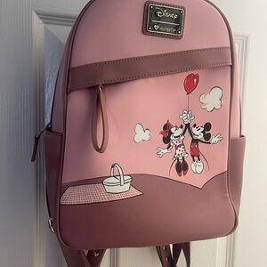 Loungefly Pink Backpack with Butterfly Motifs